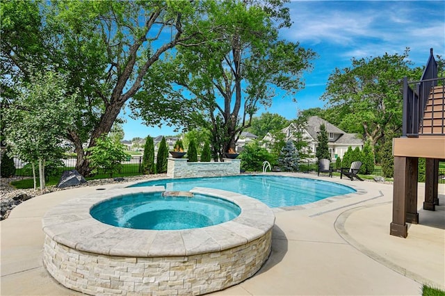 11212 W 170th Pl, Overland Park, KS 66221 - view of pool featuring a patio and a pool with connected hot tub