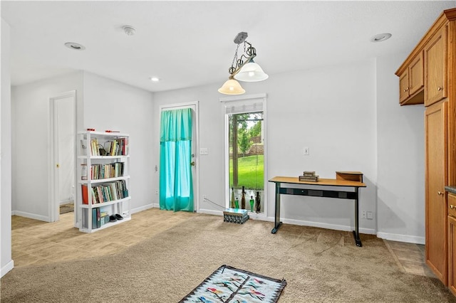 interior space with light colored carpet, recessed lighting, and baseboards