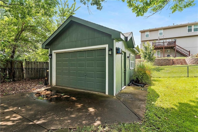 garage featuring fence