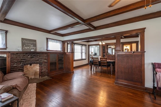 living room with a fireplace, beamed ceiling, baseboards, dark wood-style floors, and coffered ceiling