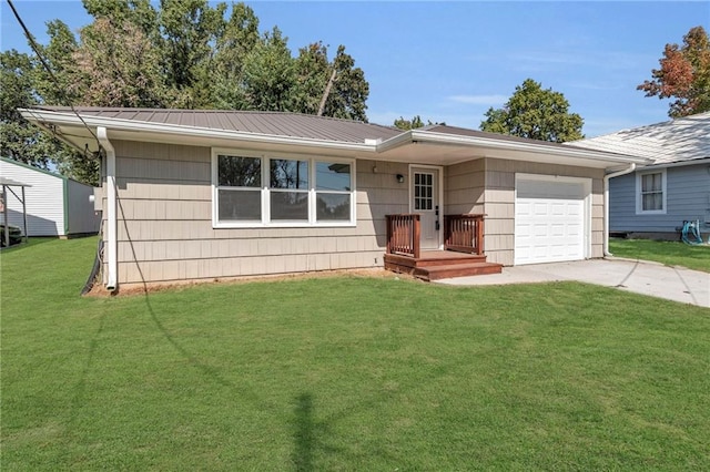 512 W 6th St, Carrollton, MO 64633 - ranch-style home with an attached garage, concrete driveway, a front lawn, and metal roof