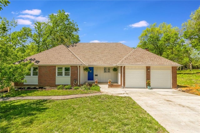 single story home featuring an attached garage, a front lawn, driveway, and brick siding