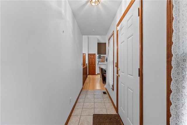 9629 N Locust Dr, Kansas City, MO 64155 - hallway featuring baseboards, visible vents, and light tile patterned floors
