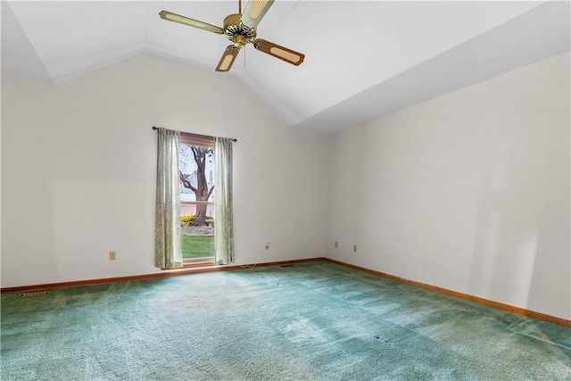 9629 N Locust Dr, Kansas City, MO 64155 - spare room with baseboards, ceiling fan, carpet, and vaulted ceiling