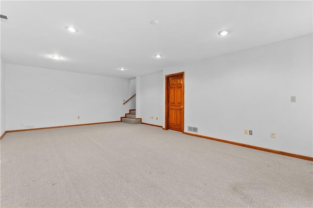 9629 N Locust Dr, Kansas City, MO 64155 - empty room featuring recessed lighting, light colored carpet, visible vents, and baseboards