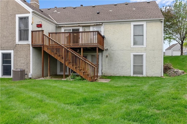 9629 N Locust Dr, Kansas City, MO 64155 - back of property with stairs, a wooden deck, stucco siding, central air condition unit, and a yard