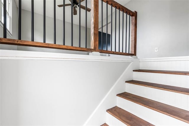 staircase with ceiling fan
