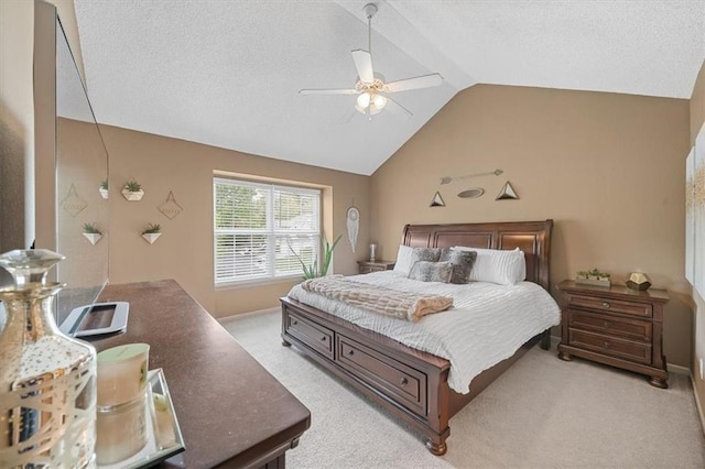 bedroom featuring ceiling fan, light colored carpet, a textured ceiling, and lofted ceiling