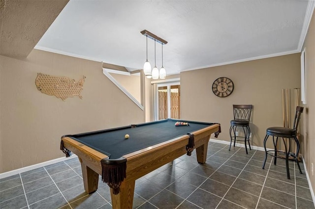 rec room with crown molding, billiards, baseboards, and dark tile patterned flooring