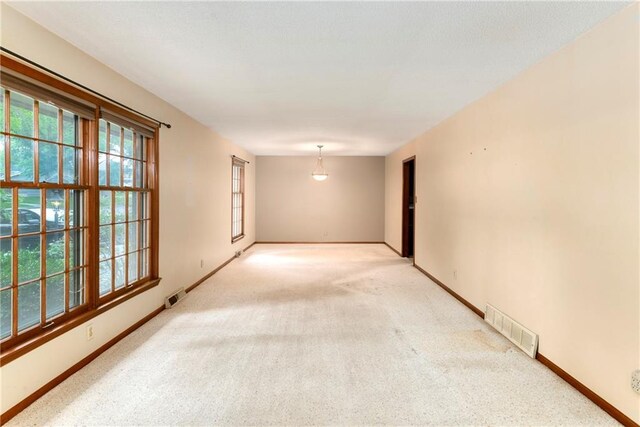 2217 Kingman St, Leavenworth, KS 66048 - empty room featuring carpet flooring and baseboards