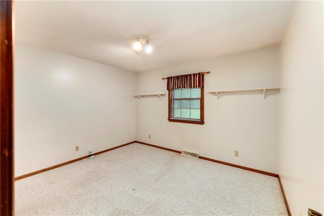 2217 Kingman St, Leavenworth, KS 66048 - carpeted spare room featuring baseboards