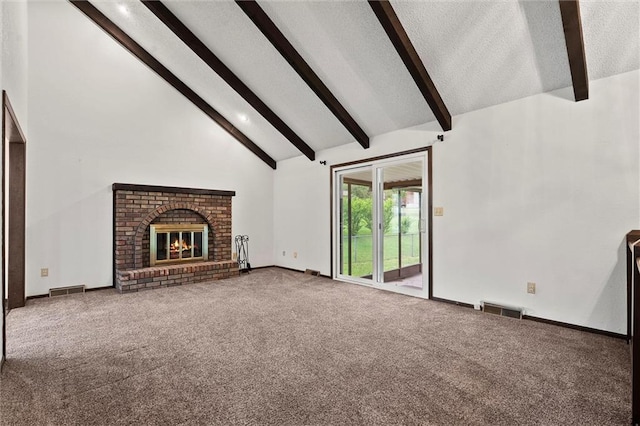 18104 E 24th St S, Independence, MO 64057 - unfurnished living room with beamed ceiling, carpet flooring, a textured ceiling, a fireplace, and high vaulted ceiling