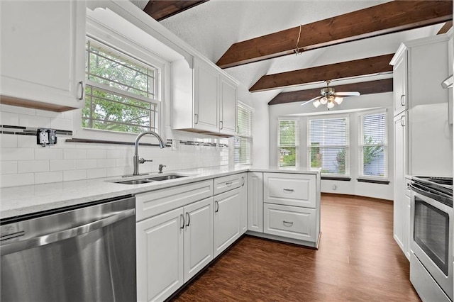 18104 E 24th St S, Independence, MO 64057 - kitchen with appliances with stainless steel finishes, a sink, tasteful backsplash, dark wood-style floors, and white cabinets