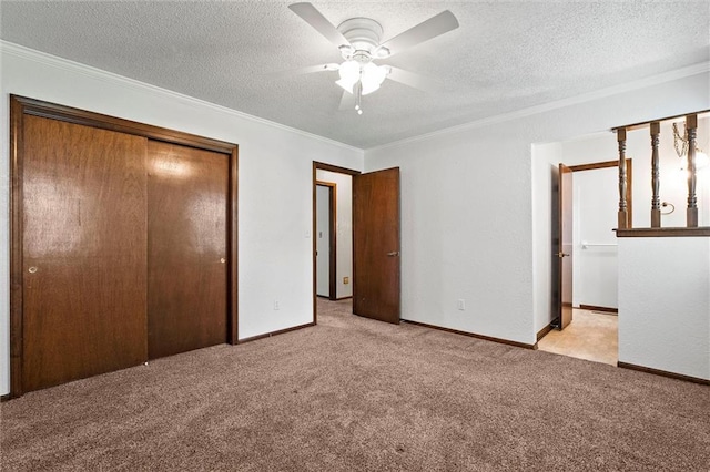 18104 E 24th St S, Independence, MO 64057 - unfurnished bedroom featuring carpet, ornamental molding, a closet, a textured ceiling, and baseboards