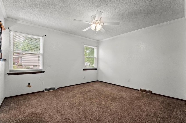 18104 E 24th St S, Independence, MO 64057 - spare room with plenty of natural light, carpet flooring, a ceiling fan, ornamental molding, and a textured ceiling