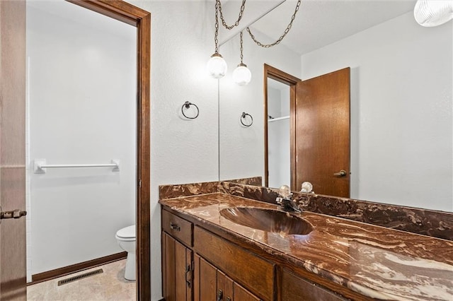 18104 E 24th St S, Independence, MO 64057 - bathroom featuring toilet and vanity