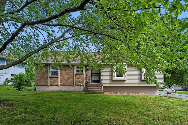 18104 E 24th St S, Independence, MO 64057 - ranch-style home with a front lawn and brick siding