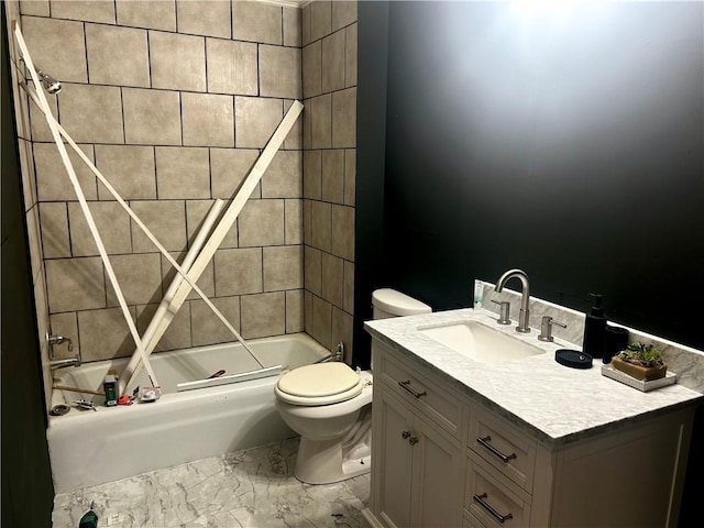 bathroom featuring vanity, toilet,  shower combination, and marble finish floor