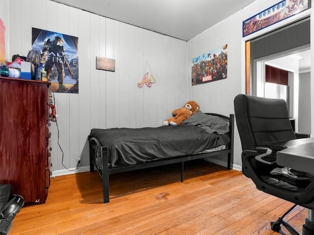 bedroom featuring light wood-style floors