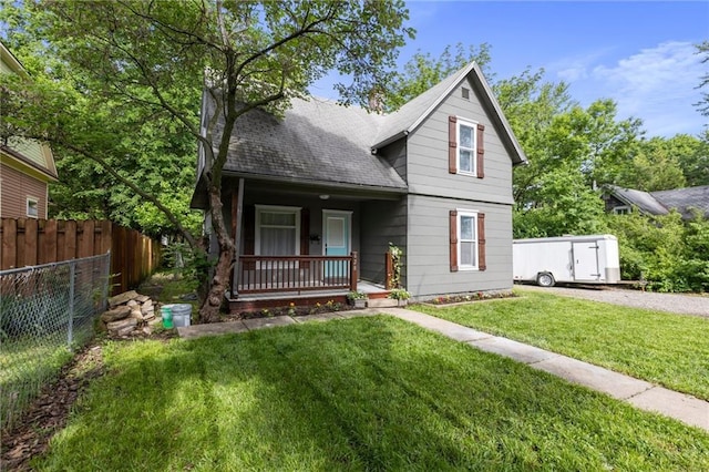 628 S Mulberry St, Ottawa, KS 66067 - view of front of house featuring a porch and roof with shingles
