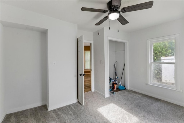 628 S Mulberry St, Ottawa, KS 66067 - unfurnished bedroom featuring carpet, a closet, baseboards, and a ceiling fan