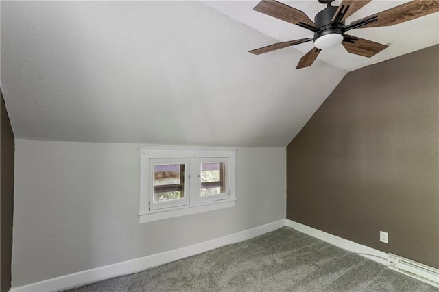 628 S Mulberry St, Ottawa, KS 66067 - bonus room featuring vaulted ceiling, baseboards, and carpet flooring