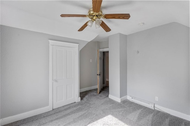 628 S Mulberry St, Ottawa, KS 66067 - unfurnished bedroom featuring carpet, baseboards, ceiling fan, and lofted ceiling
