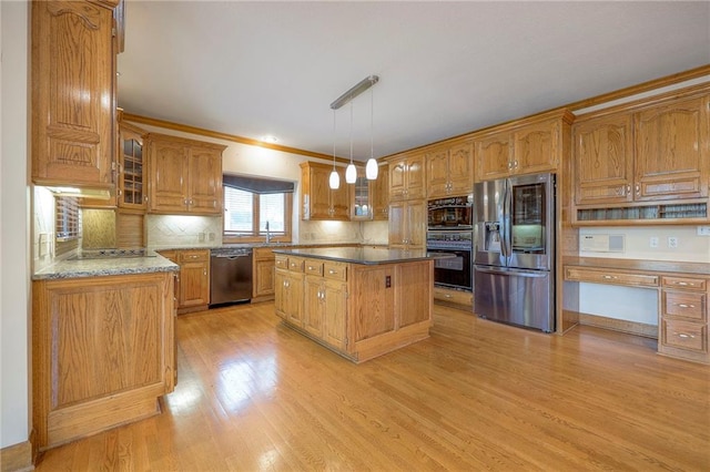 4411 N Mulberry Dr, Kansas City, MO 64116 - kitchen with glass insert cabinets, a center island, brown cabinets, a sink, and stainless steel appliances