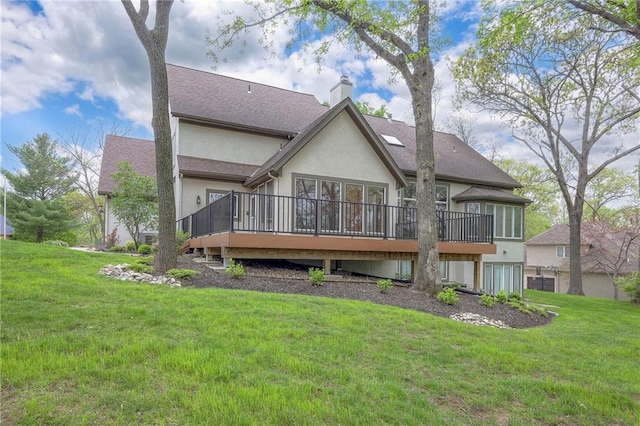 4411 N Mulberry Dr, Kansas City, MO 64116 - back of house with a chimney, stucco siding, a yard, and a deck