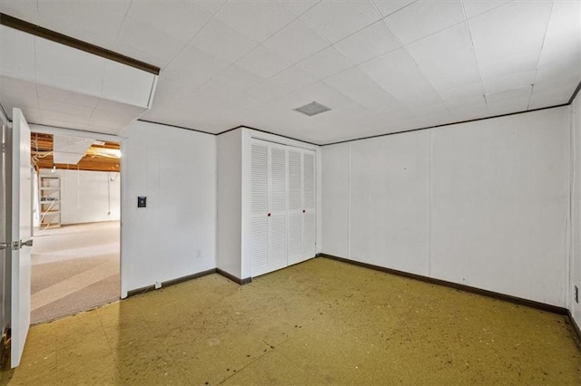 additional living space featuring baseboards
