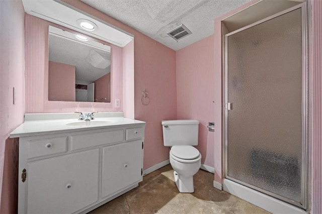 full bath with visible vents, vanity, toilet, a textured ceiling, and a stall shower