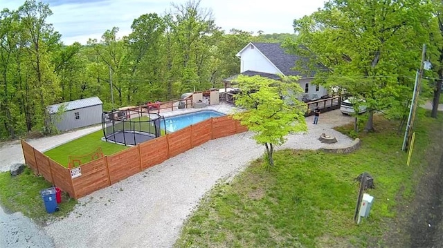 exterior space featuring a view of trees