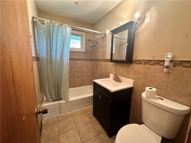 4322 Everett Ave, Kansas City, KS 66102 - full bath featuring shower / tub combo, vanity, toilet, tile patterned floors, and tile walls
