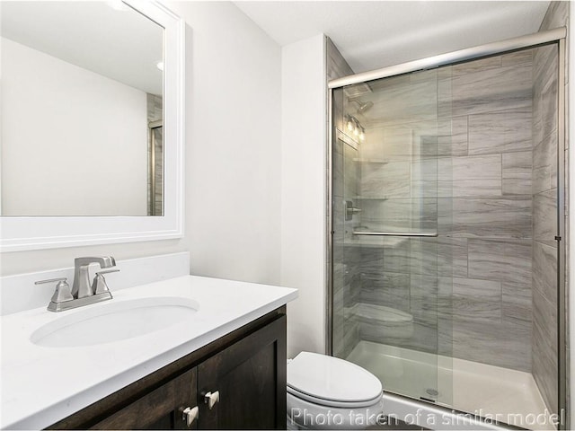 11600 S Millridge St, Olathe, KS 66061 - full bathroom with a shower stall, toilet, and vanity