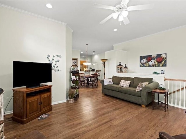11179 S Summit St, Olathe, KS 66062 - living area with a ceiling fan, ornamental molding, and wood finished floors