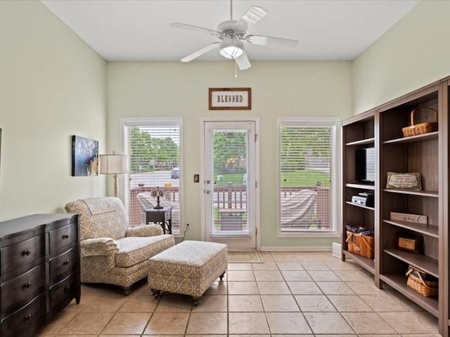 11179 S Summit St, Olathe, KS 66062 - sitting room with a ceiling fan, plenty of natural light, and light tile patterned floors