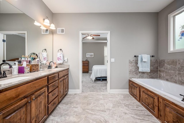full bathroom with a sink, baseboards, ensuite bath, and visible vents