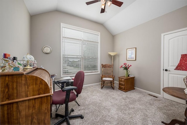 carpeted office with baseboards, ceiling fan, vaulted ceiling, and visible vents