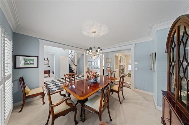 26266 W 110th Ter, Olathe, KS 66061 - dining room with stairway, a chandelier, light colored carpet, plenty of natural light, and ornamental molding
