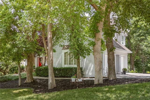26266 W 110th Ter, Olathe, KS 66061 - view of front facade featuring concrete driveway and a garage