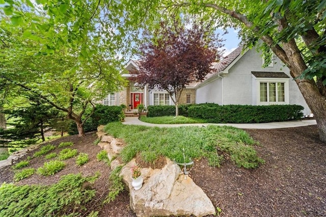 26266 W 110th Ter, Olathe, KS 66061 - obstructed view of property with stucco siding