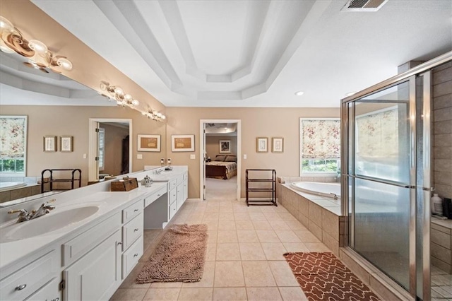 26266 W 110th Ter, Olathe, KS 66061 - ensuite bathroom featuring double vanity, a bath, a tray ceiling, tile patterned floors, and a shower stall