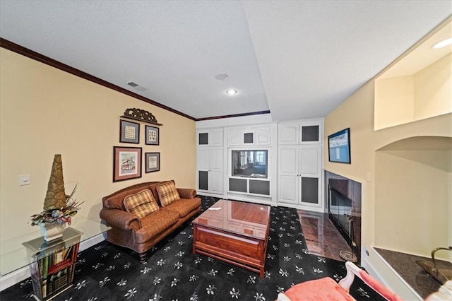 26266 W 110th Ter, Olathe, KS 66061 - living area featuring recessed lighting, crown molding, a fireplace with flush hearth, and arched walkways
