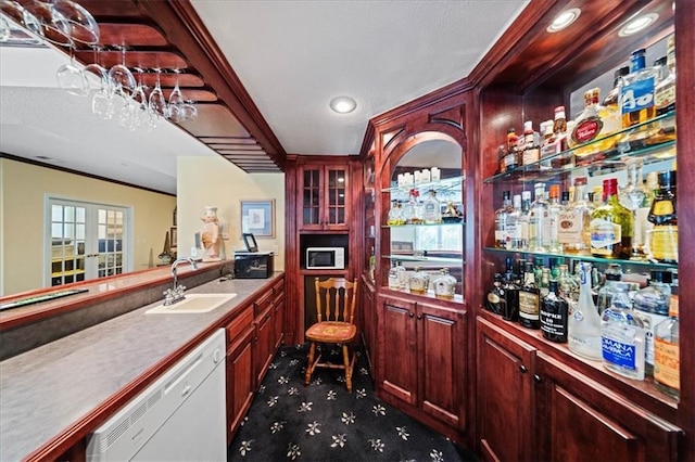 26266 W 110th Ter, Olathe, KS 66061 - indoor dry bar featuring dishwasher, recessed lighting, dark carpet, and ornamental molding
