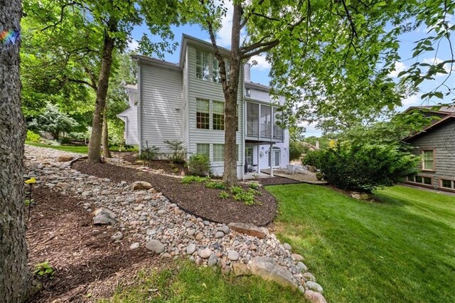 26266 W 110th Ter, Olathe, KS 66061 - rear view of house featuring a lawn