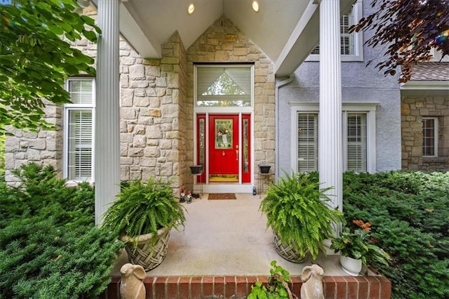 26266 W 110th Ter, Olathe, KS 66061 - entrance to property with stone siding and stucco siding