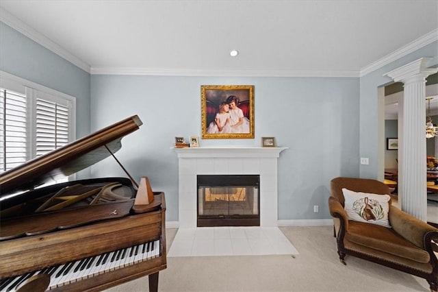 26266 W 110th Ter, Olathe, KS 66061 - sitting room with carpet flooring, decorative columns, crown molding, a fireplace, and recessed lighting