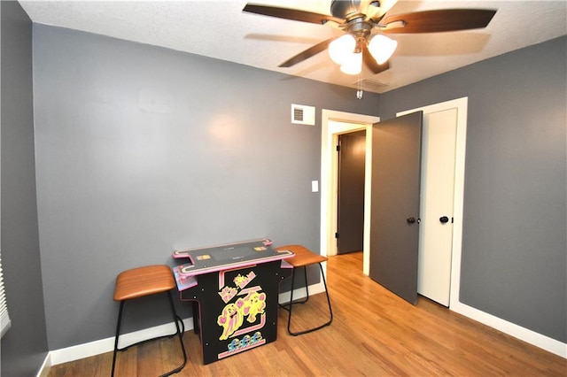 5233 N Garfield Ave, Kansas City, MO 64118 - office space with a ceiling fan, wood finished floors, and baseboards