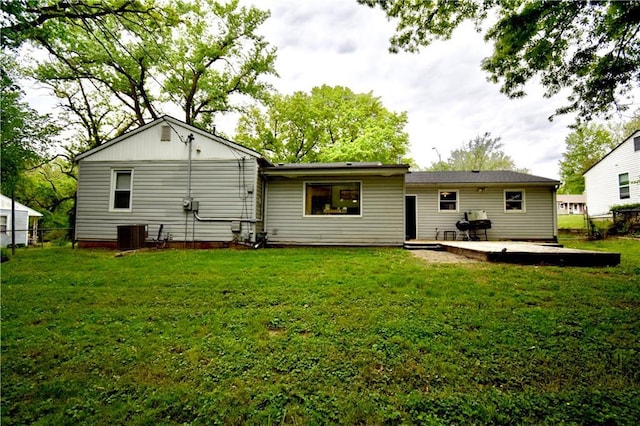 5233 N Garfield Ave, Kansas City, MO 64118 - rear view of house featuring a wooden deck