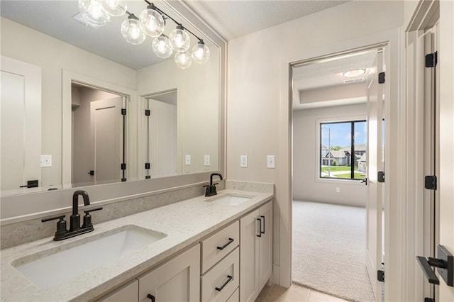 2314 SW Serena Pl, Lees Summit, MO 64082 - bathroom featuring double vanity and tile patterned floors